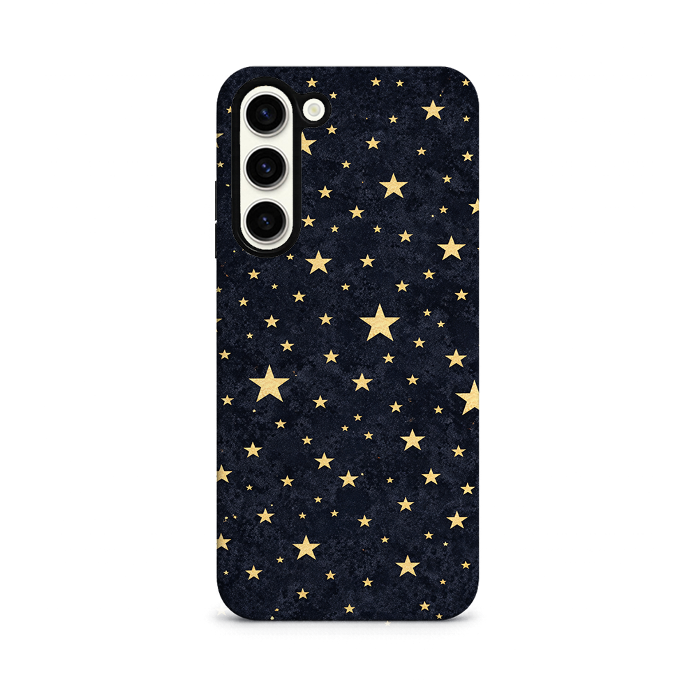 A phone case with a dark background decorated with gold stars of various sizes scattered across the surface.