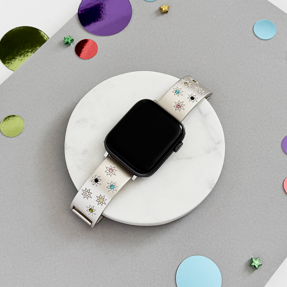 A smartwatch with a floral band is centered on a red rectangular background, surrounded by decorative red roses arranged in a symmetrical pattern.