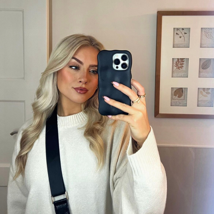 Girl holding phone case