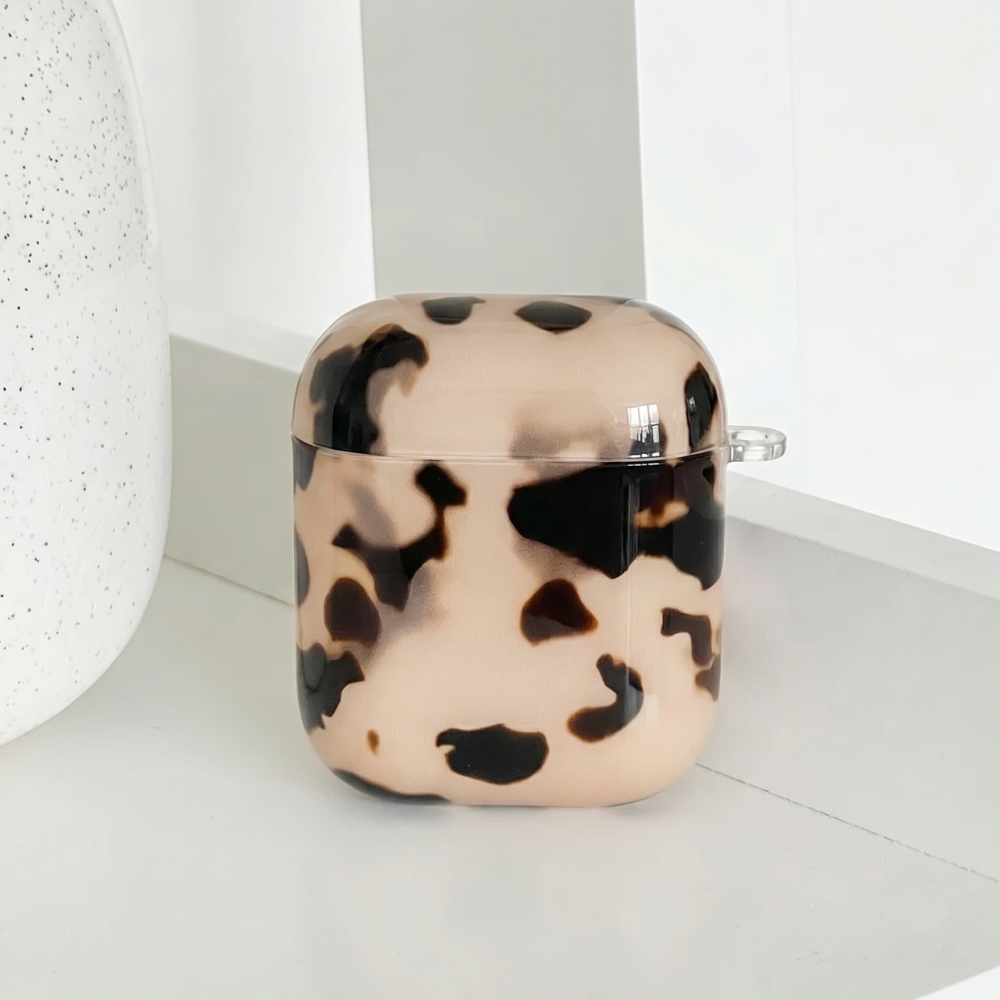 Ivory tortoiseshell print AirPods Case.