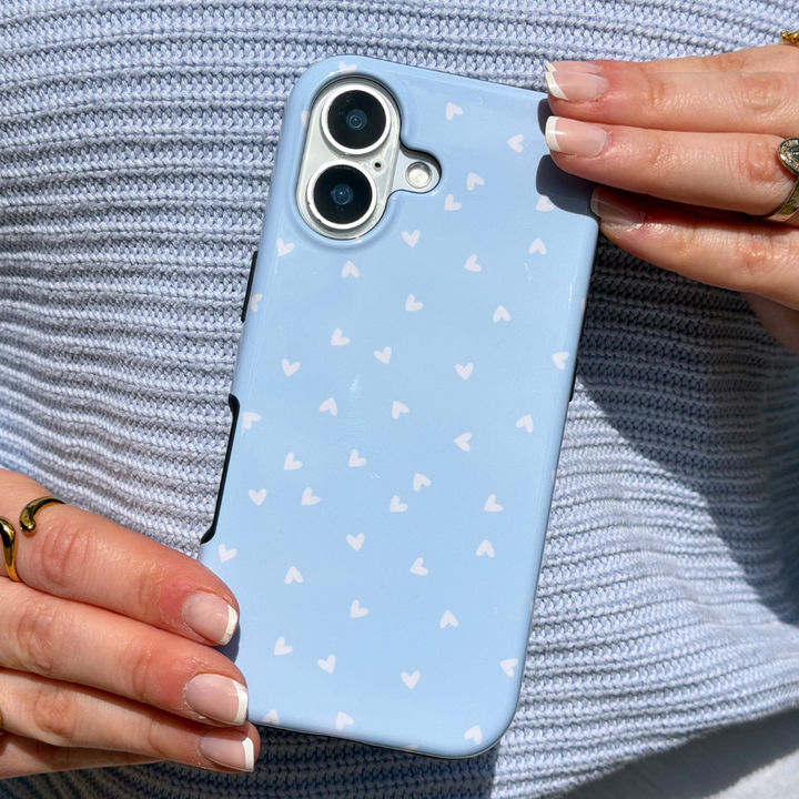 Close up image girl holding Blue Hearts Tough Phone Case