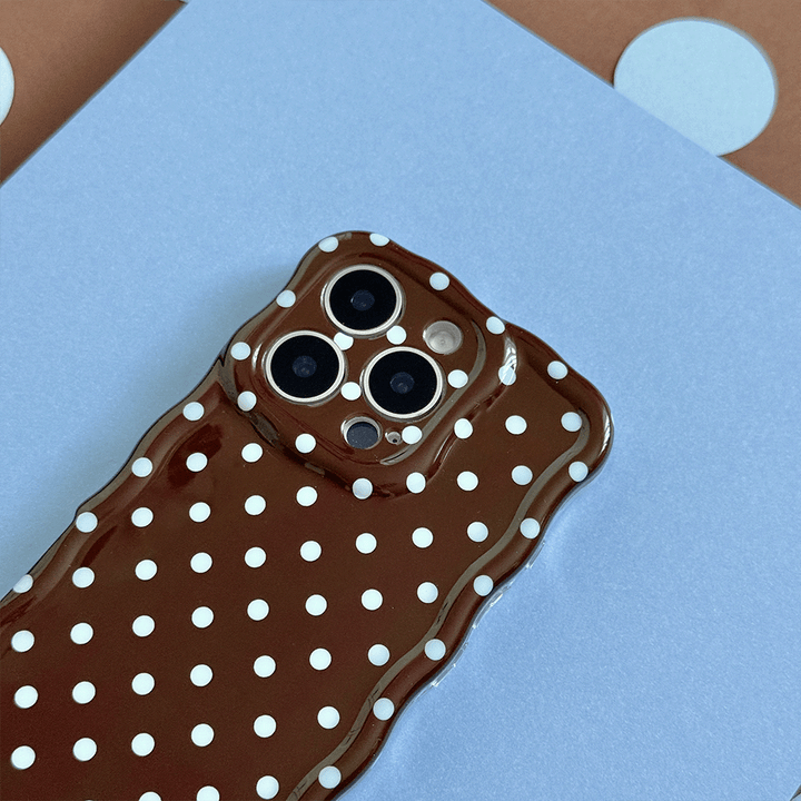 Brown Phone Case with blue polka dot design.