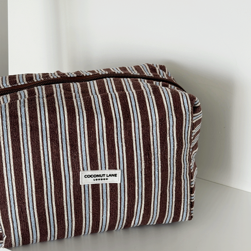 Brown towel texture Makeup Bag with blue and white stripe design. 