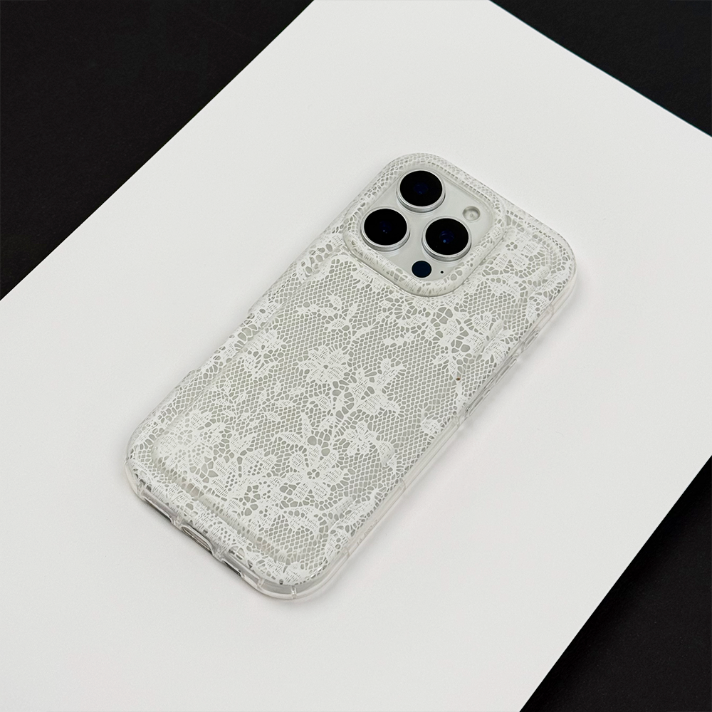 Clear Phone Case with lace design on a white surface.