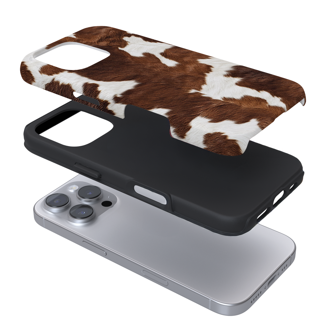 Expanded view of a phone case with a brown cow pattern on a white background