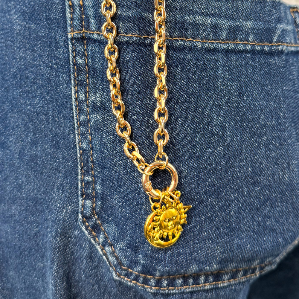 Moon charm attached to strap with o ring lifestyle image
