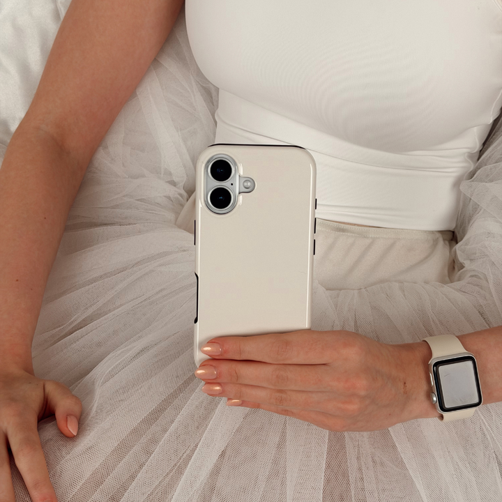 Girl holding the Tough Cloud Dancer Phone Case