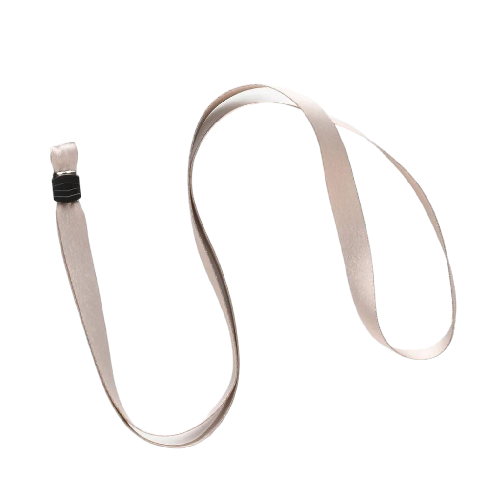 A light brown, smooth satin ribbon is shown against a plain white background. The ribbon is loosely coiled, resembling the Lanyard - Plain Nude by Coconut Lane, with one end featuring a small black clip attachment.