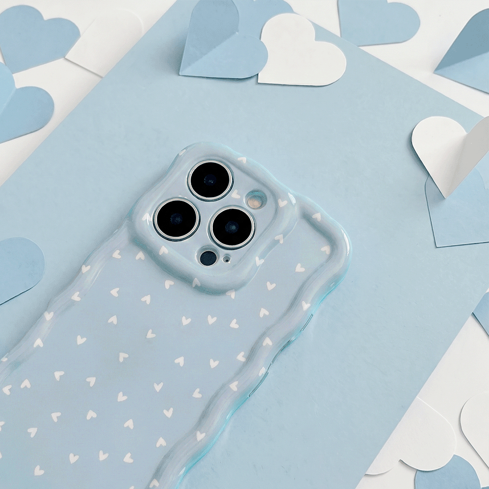 Wavy Phone Case with blue background and white hearts design. 