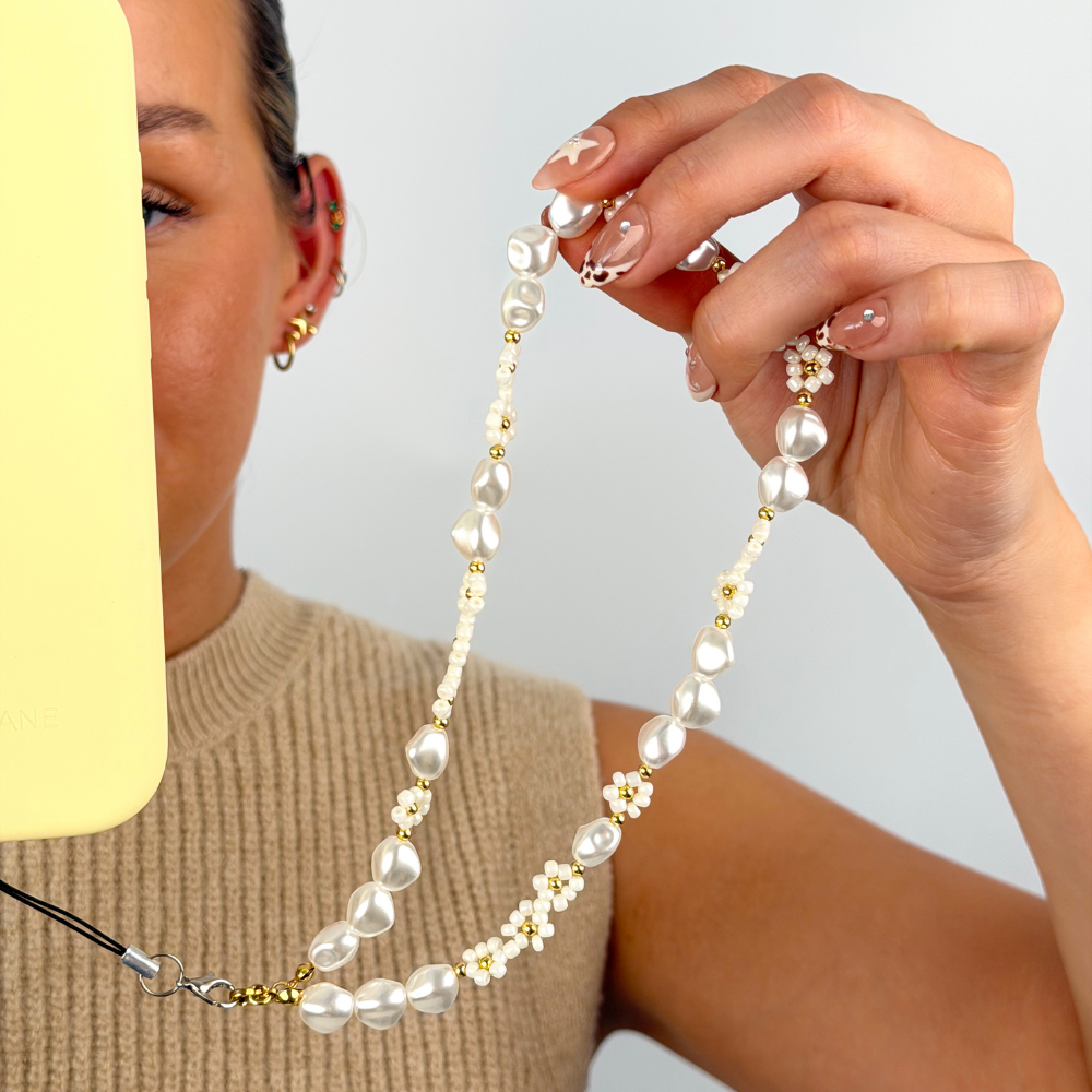 Pearl Core Phone Strap attached to phone case