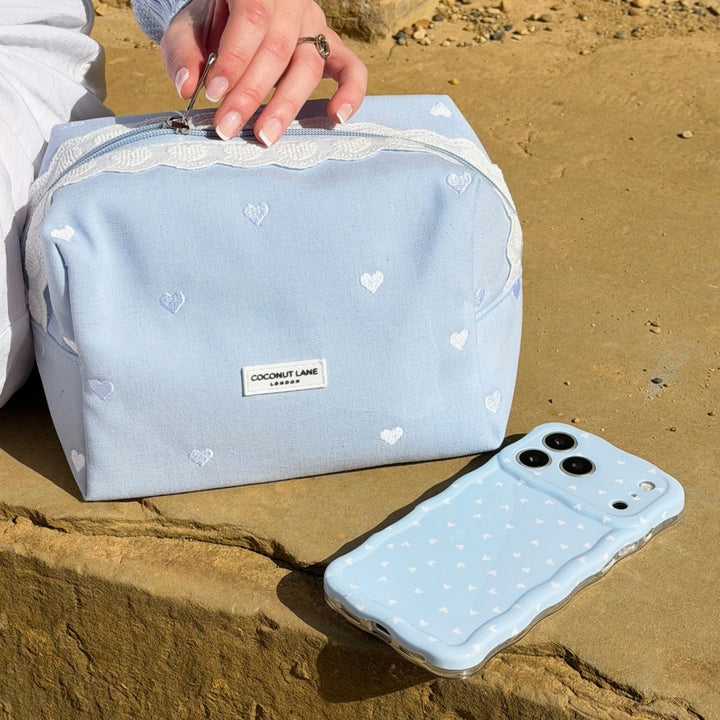 Powder blue hearts makeup bag with matching phone case