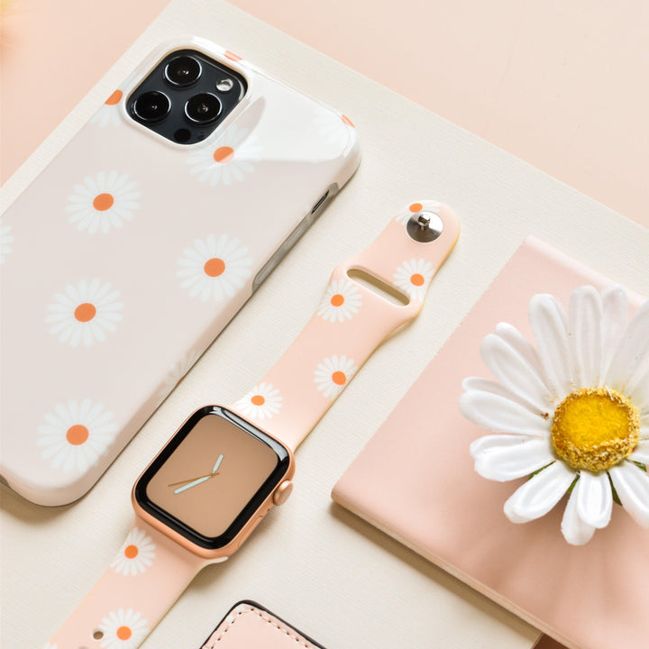 daisies-on-beige-background-tech-accessories