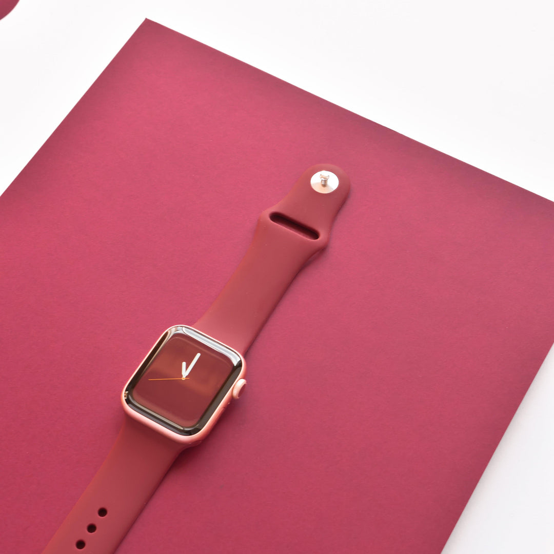 wine-purple-apple-watch-strap-on-gold-apple-watch