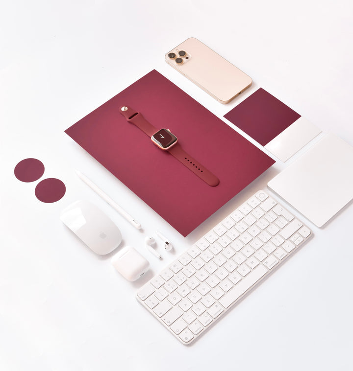 wine-purple-apple-watch-strap-surrounded-by-apple-technology