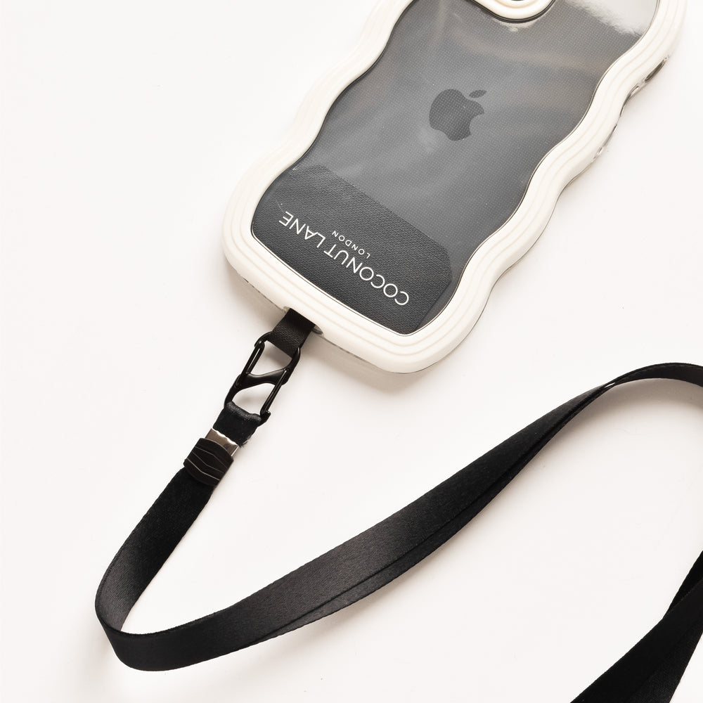 A translucent and white phone case featuring a wavy border displays an Apple logo along with the words "COCONUT LANE" in white text. This Universal Phone Patch by Coconut Lane includes an attached black strap with a clip, perfect for securely carrying your phone. It is shown on a white surface.