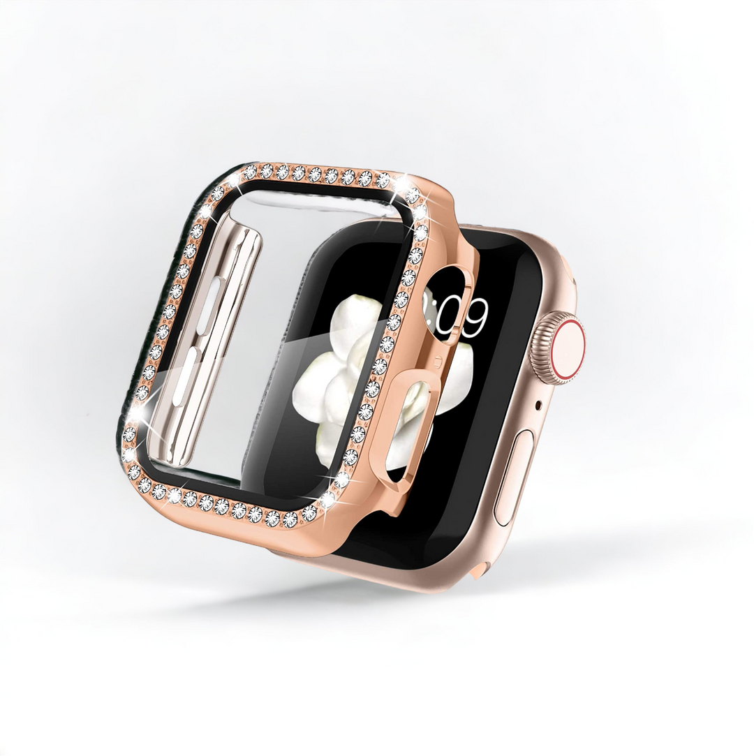 Close-up of Coconut Lane's 2-in-1 Apple Watch Case & Built-In Screen Protector in Rose Gold Diamante, adorned with a sparkling, crystal-encrusted frame. The sleek design showcases an Apple Watch displaying a white floral image on the watch face. The side button stands out against the white background.